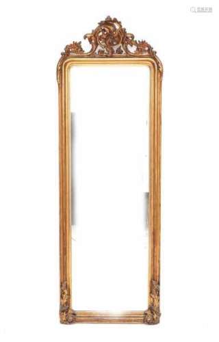 A gilt mantle mirror. Circa 1900.223 x 68 cm.- - -29.00 % buyer's premium on the hammer price, VAT
