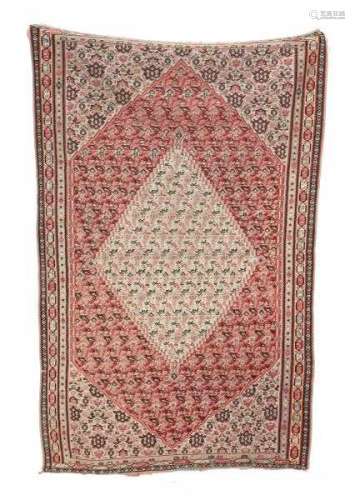 An oriental wall carpet. Kelim with a floral pattern. 20th centuryDimensions 202 x 128 cm.- - -29.00