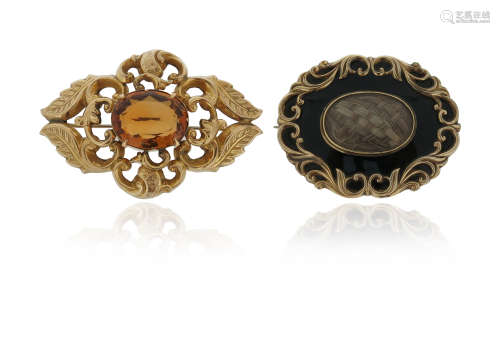 A Victorian citrine-mounted gold scroll brooch