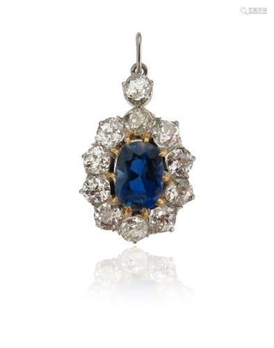 A sapphire and diamond cluster pendant