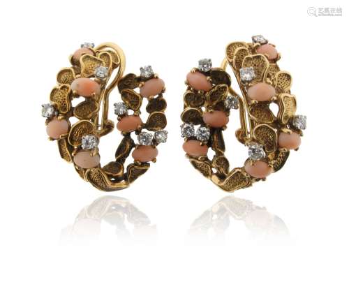 A pair of coral and diamond-set earrings