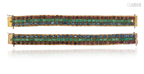 A pair of gem-set gold bracelets