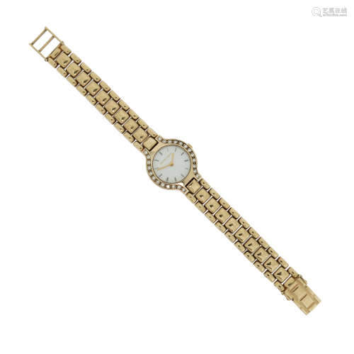 A lady's gold wristwatch by Bueche Girod