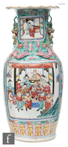 A 19th Century Chinese Canton vase of baluster form, applied with relief moulded handles, the