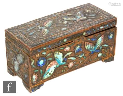 A late 19th to early 20th Century Chinese gilt metal 'Jewelled' lidded box, of rounded form, inset