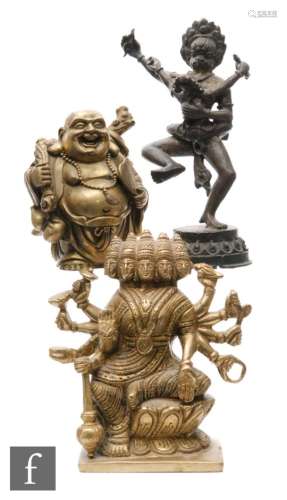Two figure cast metal examples, each raised on lotus throne bases, height 20cm and 30cm. (2)