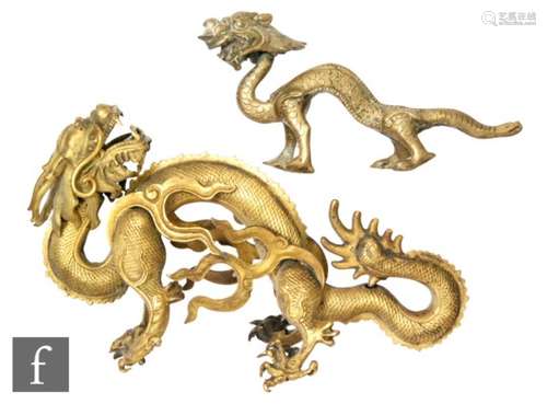 Two 19th Century Chinese gilt-metal figures of five-clawed dragons, previously forming the handles