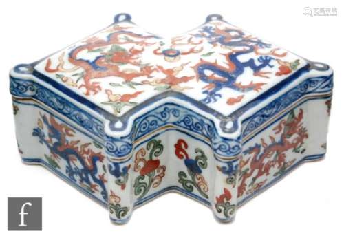 A Chinese Wucai double triform box and cover, painted in underglazed blue, overglazed red and
