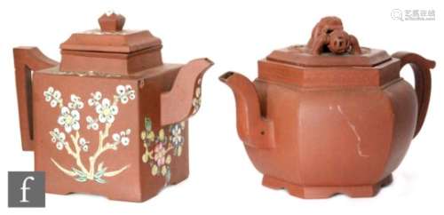 Two Chinese Yixing style teapots, the first of square section with arched spout and angular
