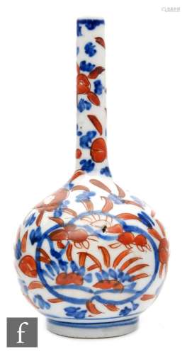 A 19th to 20th Century Japanese Imari bottle vase, the rounded body rising to a slender