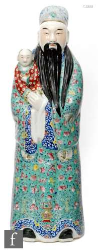 A Chinese late Qing Dynasty (1644-1912) or Repubic Period (1912-1949) figure of a Taoist Immortal,