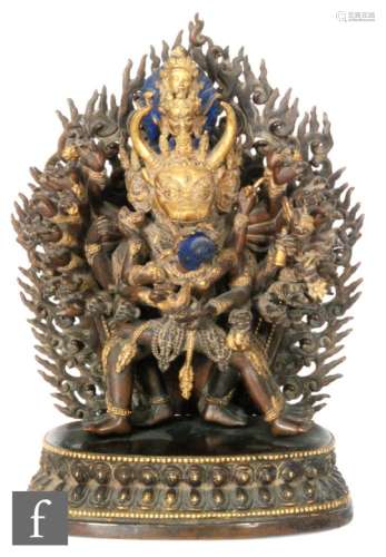 An 18th or 19th Century Sino-Tibetan gilt bronze shrine to Vajrabhairava, one of the principal