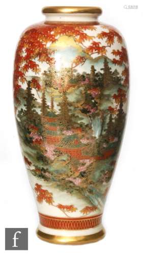 A Japanese Satsuma vase of slender ovoid form, rising to a folded rim, the ivory coloured crackle