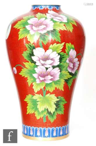 A Chinese cloisonne vase, late Qing Dynasty (1644-1912), of meiping form, the red ground inlaid with