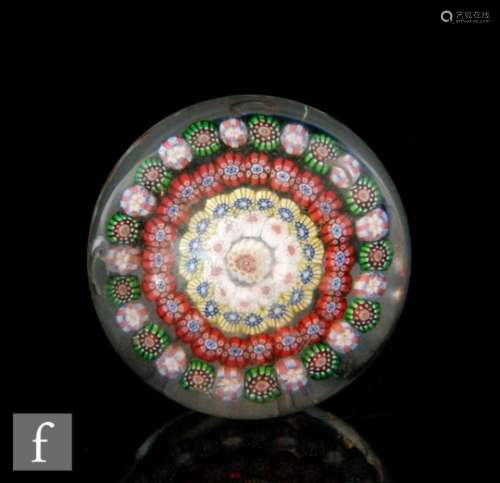 A 19th Century French paperweight in the manner of Baccarat, with four concentric rings of