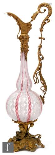 A late 19th Century Venetian glass decanter in gilt metal mounts, globe and shaft form with internal
