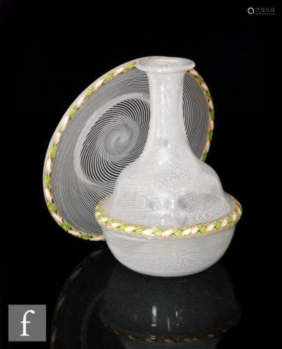 A 19th Century Clichy glass carafe of globe and shaft form with a fine white spiral line and applied