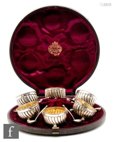 A cased set of six Victorian hallmarked silver open, circular salts and spoons, Birmingham 1882,