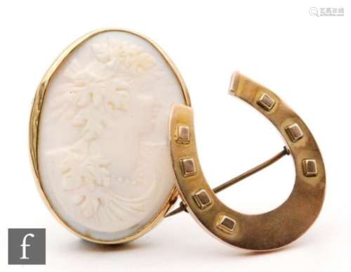 A 9ct hallmarked brooch modelled as a horseshoe Birmingham 1887, weight 3.3g, with a similar cameo