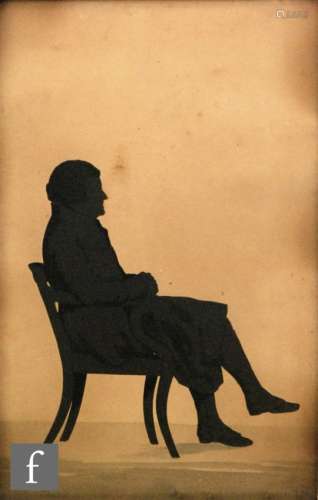 ENGLISH SCHOOL (C.1850) - A portrait of a seated gentleman, a painted silhouette, framed, 26cm x