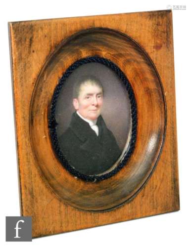 CIRCLE OF JOHN COX DILLMAN ENGLEHEART(1782-1862) - Portrait of a gentleman wearing a black top coat,