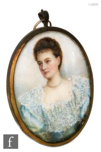 ENGLISH SCHOOL (CIRCA 1870) - Portrait of a young lady wearing a blue dress with lace collar, half
