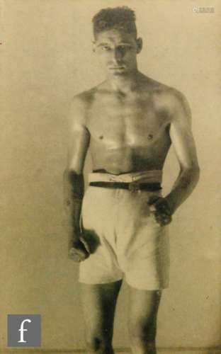 MONTAGUE GLOVER (1898-1983) - Portrait of an athletic young man wearing WWI riding breeches and