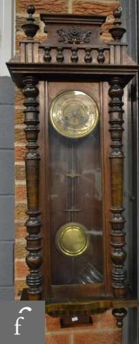 A 19th Century walnut cased spring driven regulator wall clock, the centre dial embossed with a moth