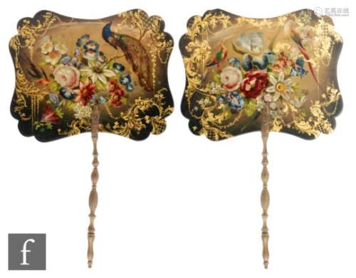 A pair of 19th Century papier mache painted face fans, each decorated with a central bouquet of