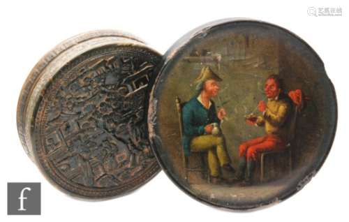 A 19th Century Chinese carved circular horn snuff box decorated with figures, pagodas and garden