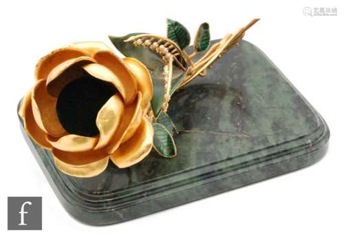 After Carl Faberge, a gilt and green enamelled model of The Princess Grace Royal Anniversary rose,