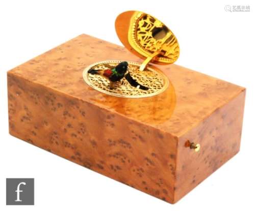 A 20th Century singing bird box by Charles Reuge, Switzerland in birds eye maple case, fixed key