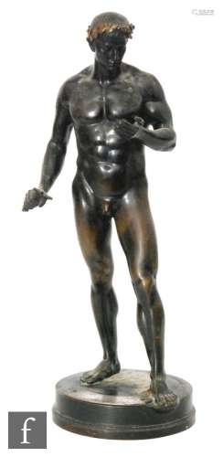 Fritz Heinemann (German 1864 -1932) - A bronze study of a naked young Caesar wearing a gilt laurel
