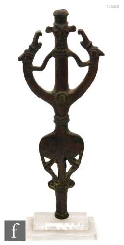 A Luristan ?Master of Animals? bronze finial, 1st millennium BC, mounted on a Perspex stand, 18cm.