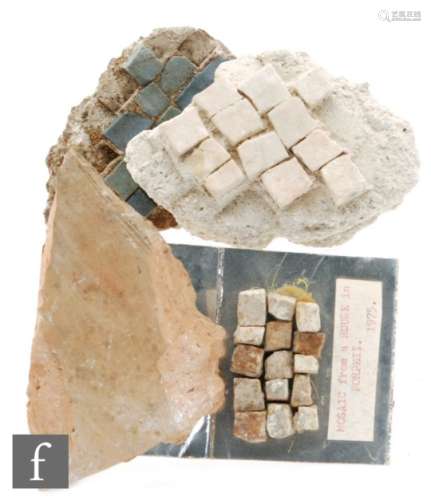 A small section of Roman glass mosaic set in its original matrix, another plain section and a number