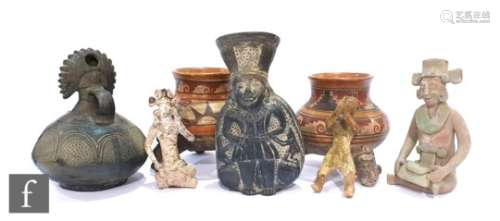 A Peruvian Chimu blackware anthropomorphic vessel, another figural blackware vessel, two