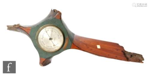 A World War One propeller boss with later inset James Lucking & Co aneroid wall barometer, bearing a