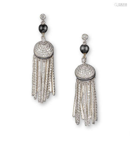 A pair of onyx and diamond drop earrings