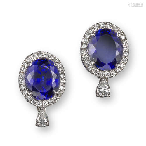 A pair of synthetic sapphire and diamond cluster ear studs