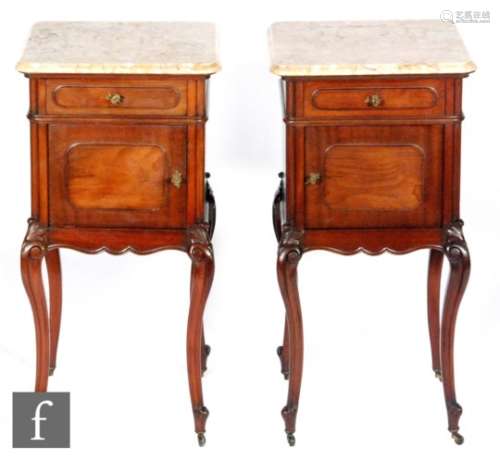 A pair of early 20th Century bedside or night cabinets in the French taste, each with a variegated