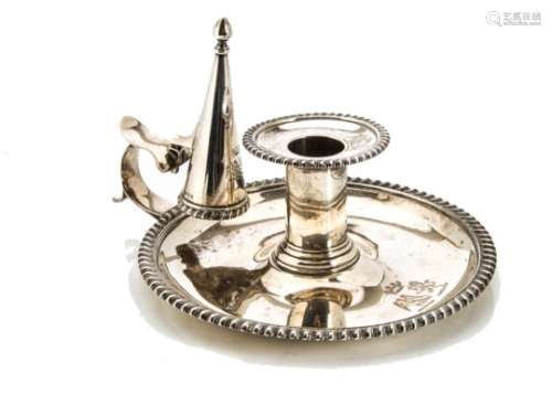 A good Victorian silver chamberstick from James Garrard, typical form with feathered rim and