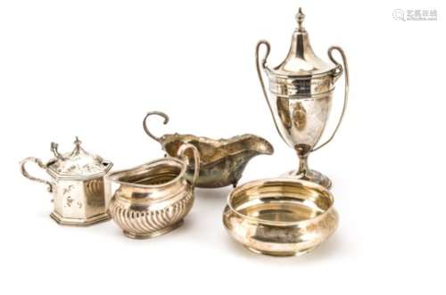 Five 20th century items of silver, including a twin handled trophy cup and cover, a mustard, with