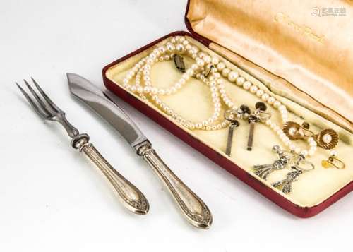 A set of six silver handled dessert knives, and five matching forks, together with a pair of Swedish