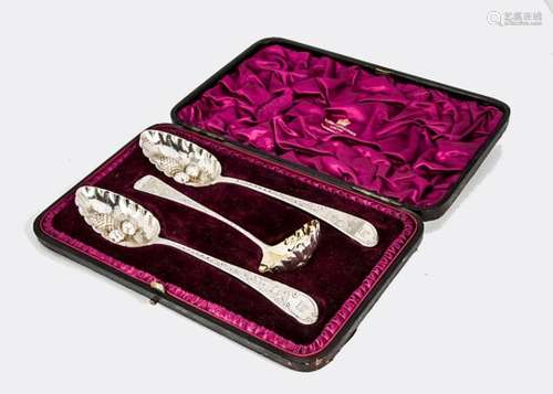 A harlequin George III silver three piece berry spoon set, having a pair of tablespoons by TP and