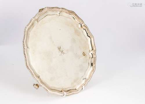 An early 20th century Indian silver salver Grish Chunder Dutt, shaped feathered rim, bearing