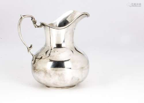 A mid 20th century Columbian silver jug, marked Florentino Bogoto .900 to base and with engraved