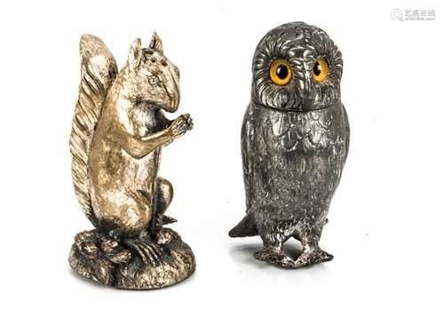 Two novelty peppers, a pewter owl and a squirrel