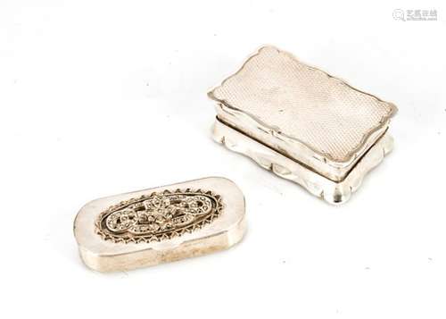 A 1980s silver pill box from SJR, together with a small white metal and marcasite box (2)