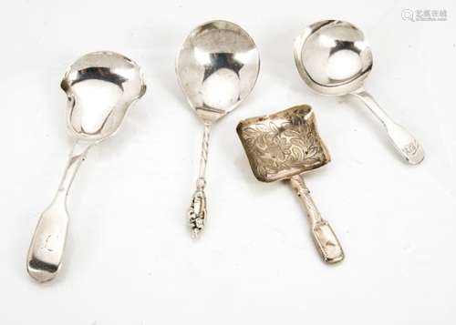 A group of four Georgian and Victorian silver tea caddy spoons, with examples by Charles Boyton,