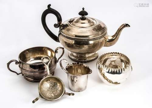 A George V silver teapot by HJAB, together with a silver sugar basin and a silver cream jug, 20 ozt,